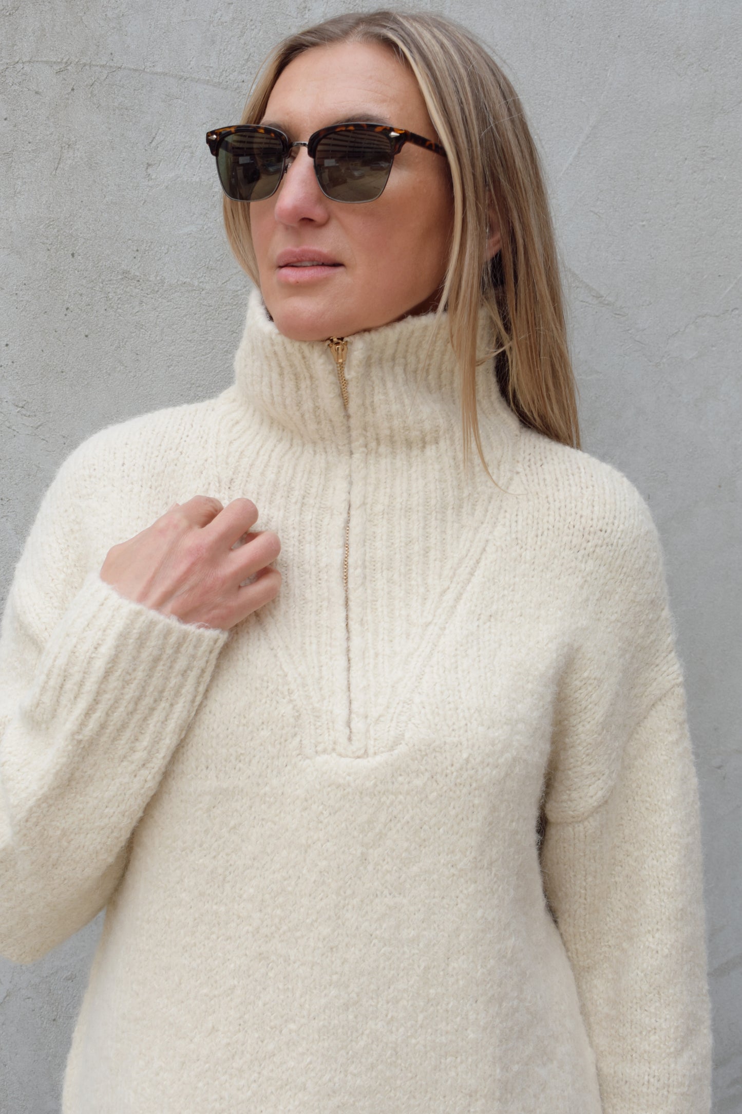 cozy knit blend quarter zip sweater with fold over collar, ribbed hem, full length and loose fit, drop shoulders