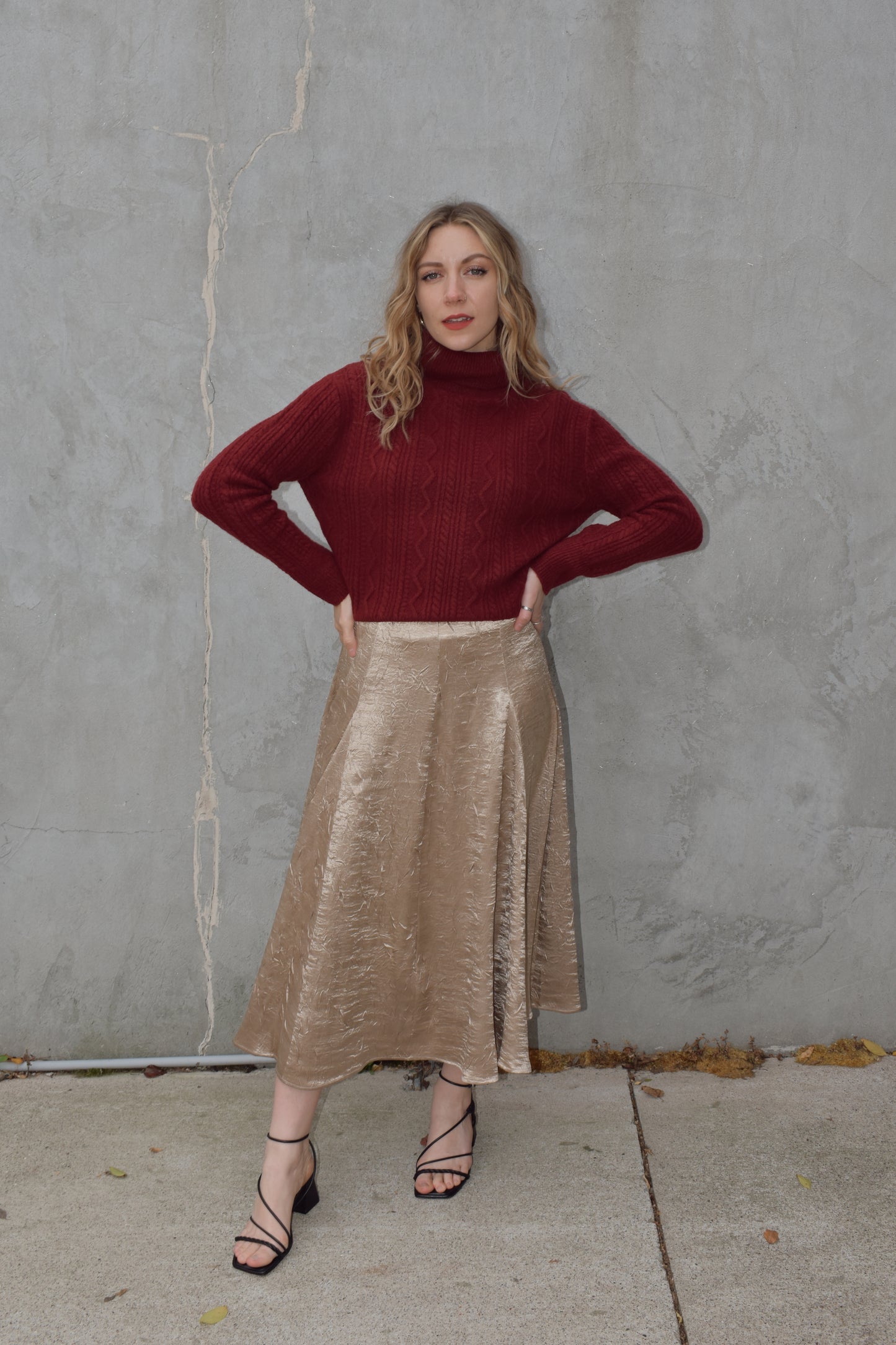 textured gold midi skirt with pleated details, a line flare, zip back enclosure, fitted waist