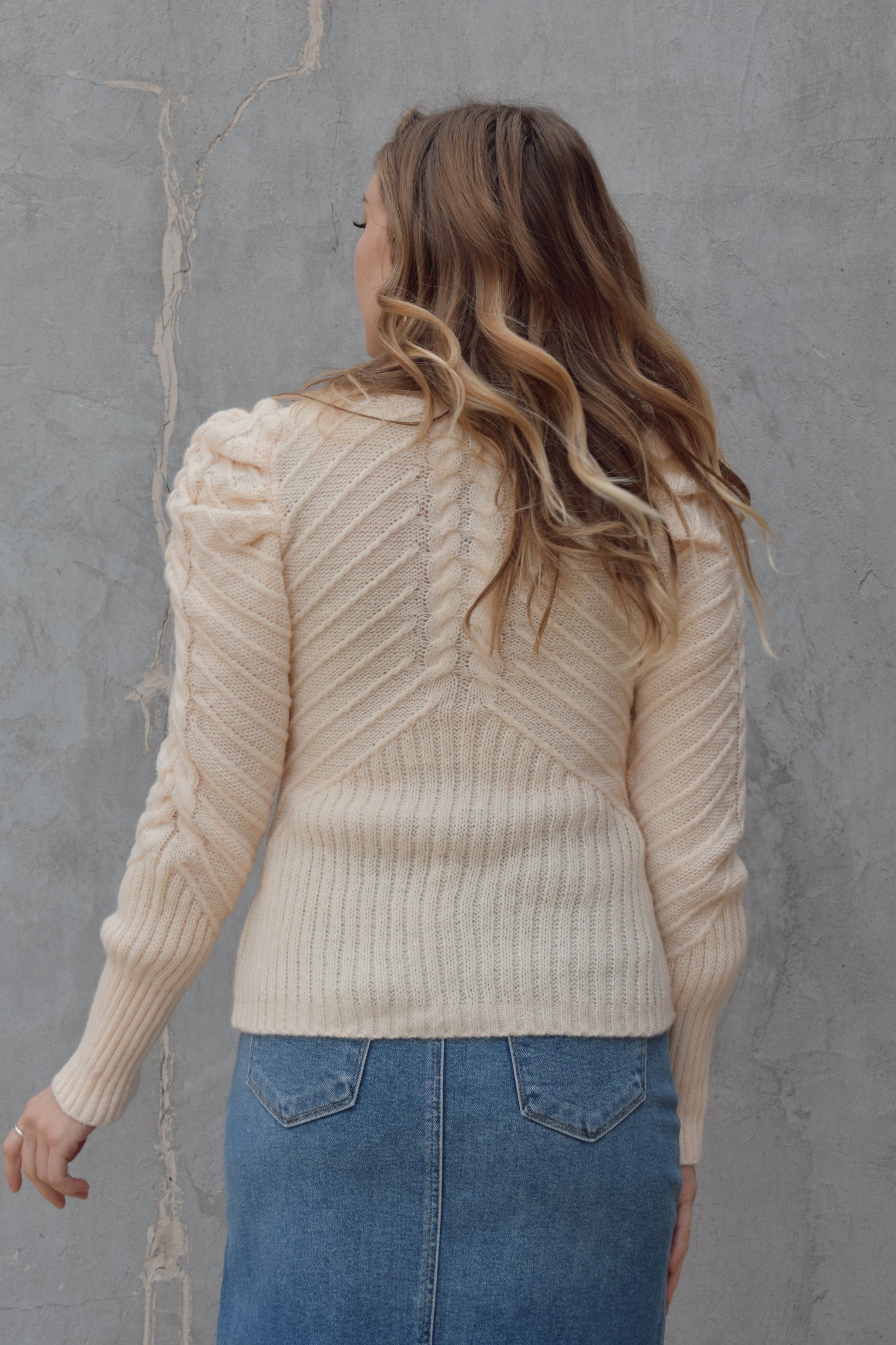 full length mock neck sweater with drama puff sleeves and a braided ribbed texture down the front and back and sides of sleeves in a v pattern, ribbed at bottom of sleeves and hem