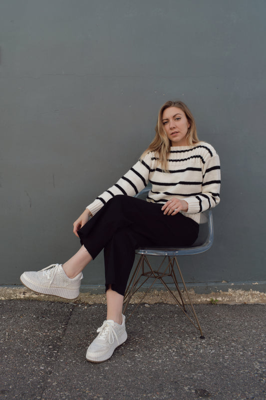 full length striped sweater with boat neck and ribbed detailing on neckline, hem and cuffs. horizontal stripes