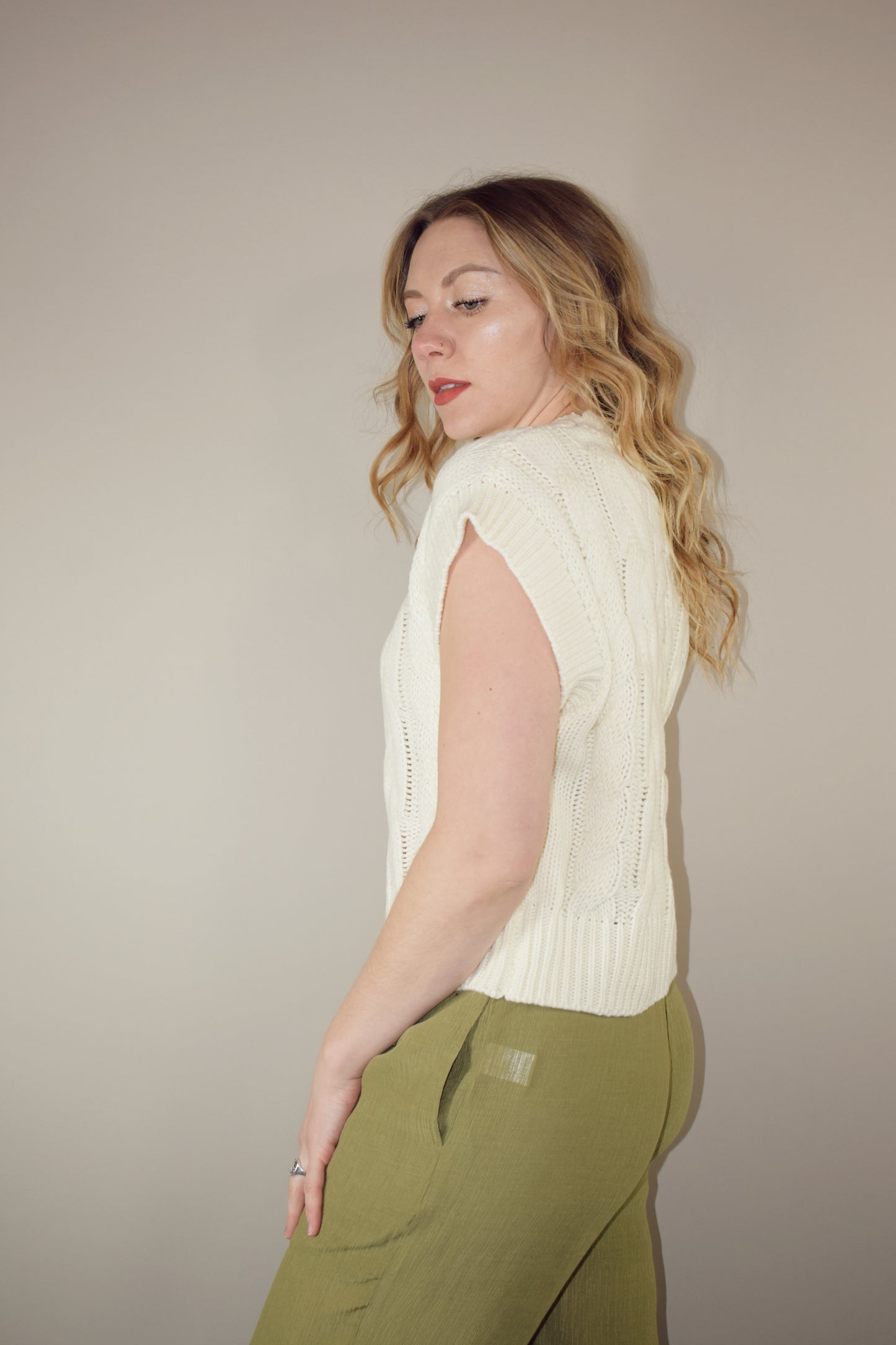 relaxed fit cable sweater vest full length crew neckline