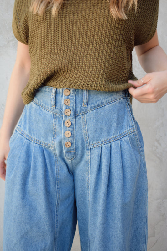 high waisted palazzo jeans light weight has pockets dropped yoke seam and pleats wooden button front enclosure
