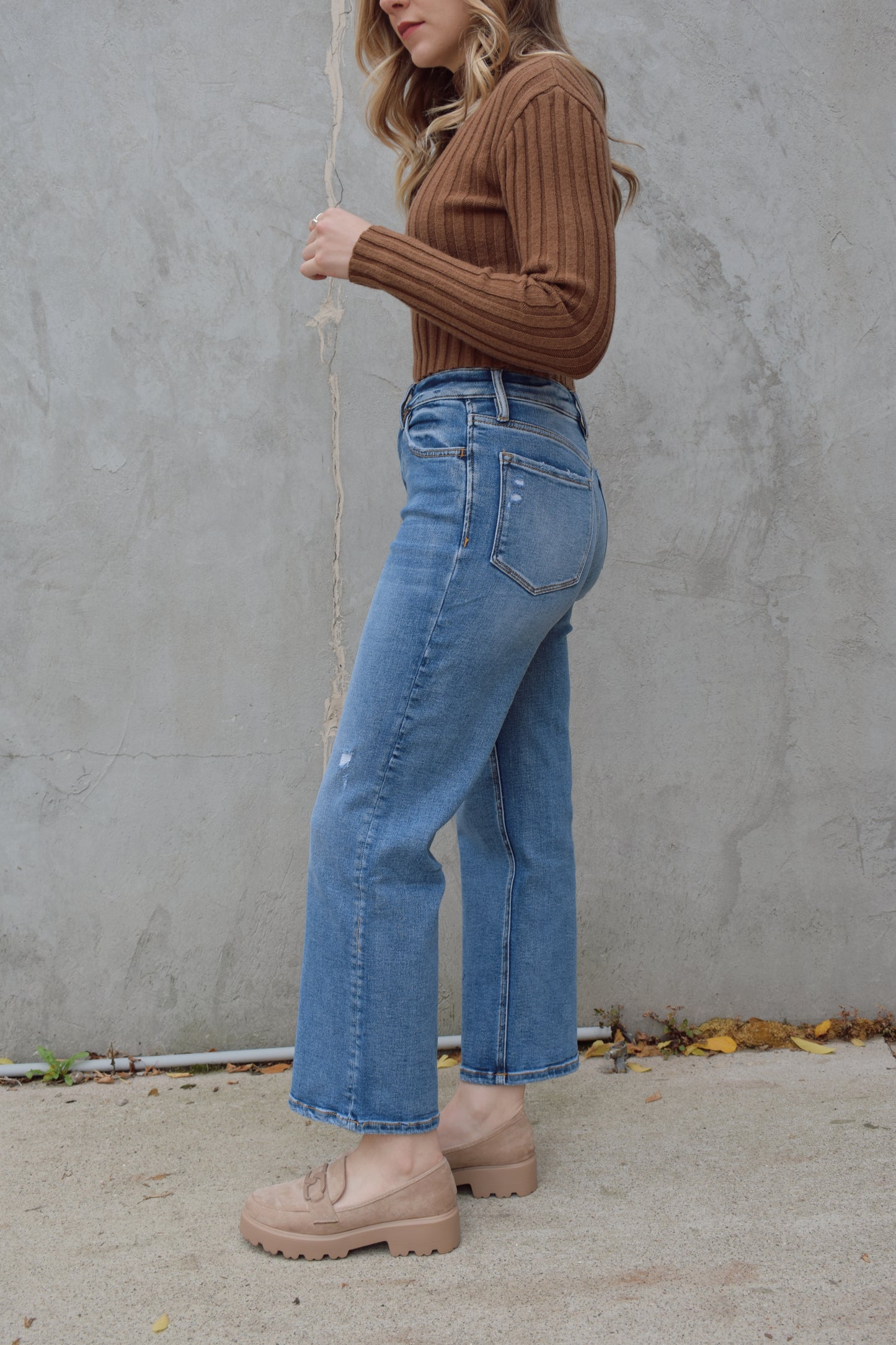 slim wide leg jeans cropped high rise medium wash light distressing marks but no holes stretch denim