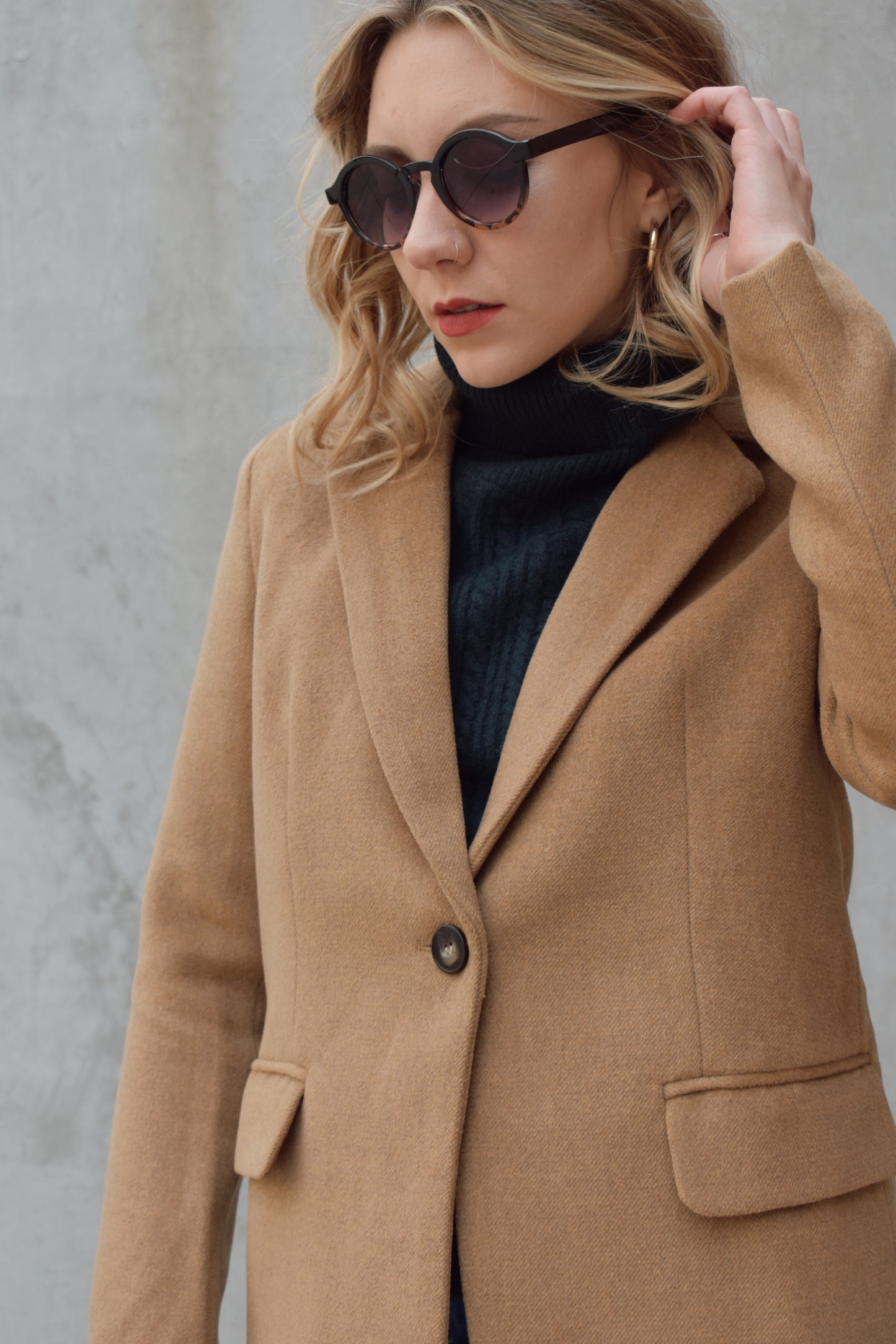 camel pea coat/ blazer with lapel collar, one button closure, patch pockets with flaps in the front, lined, hits at upper thigh area