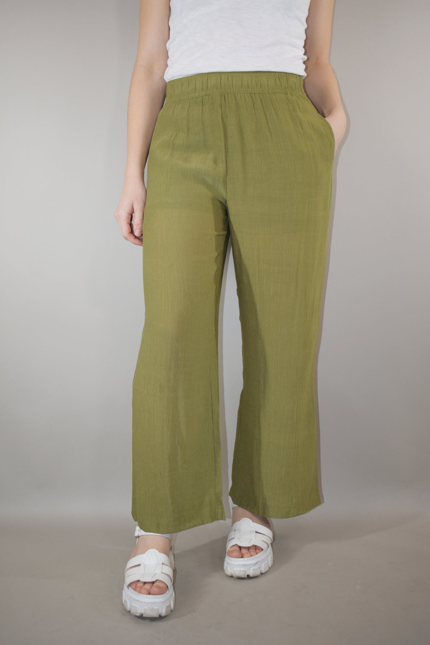 breezy lightweight olive pants slight wide leg high waisted with elastic waistband and shorts length liner has pockets in front not in back