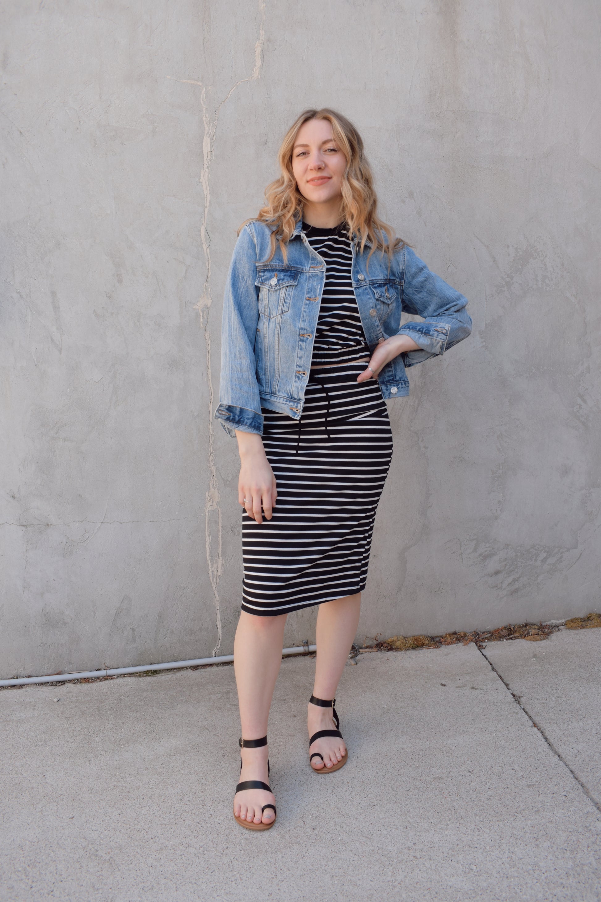 medium wash distressed jean jacket staple for wardrobe relaxed fit full length