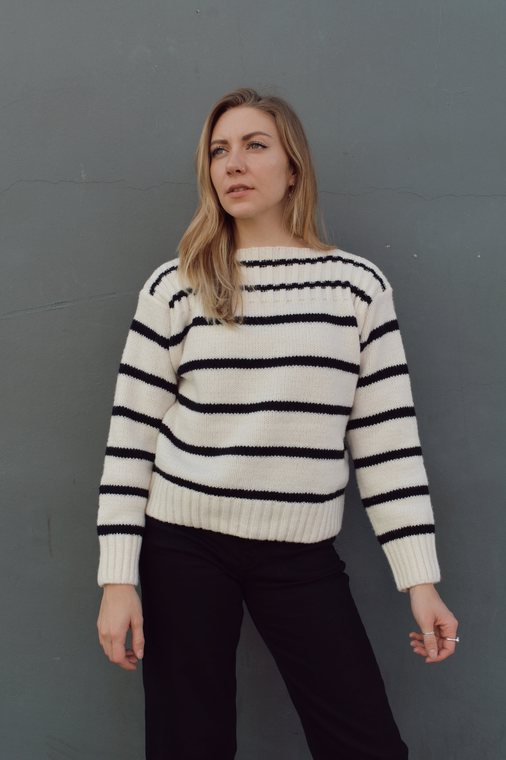 full length striped sweater with boat neck and ribbed detailing on neckline, hem and cuffs. horizontal stripes