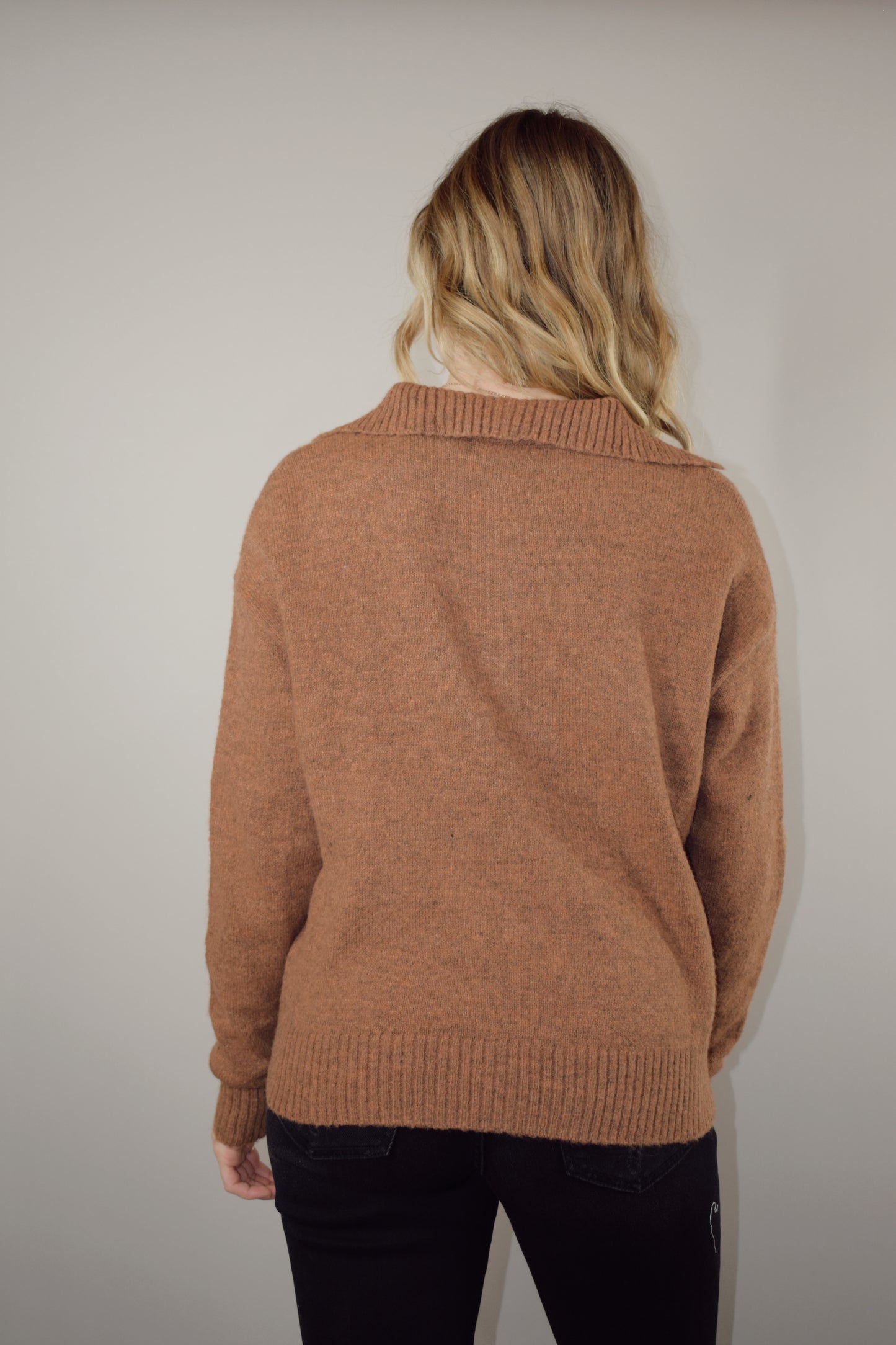 full length sweater with collar and 3 buttons down the neckline with ribbed panel -relaxed fit