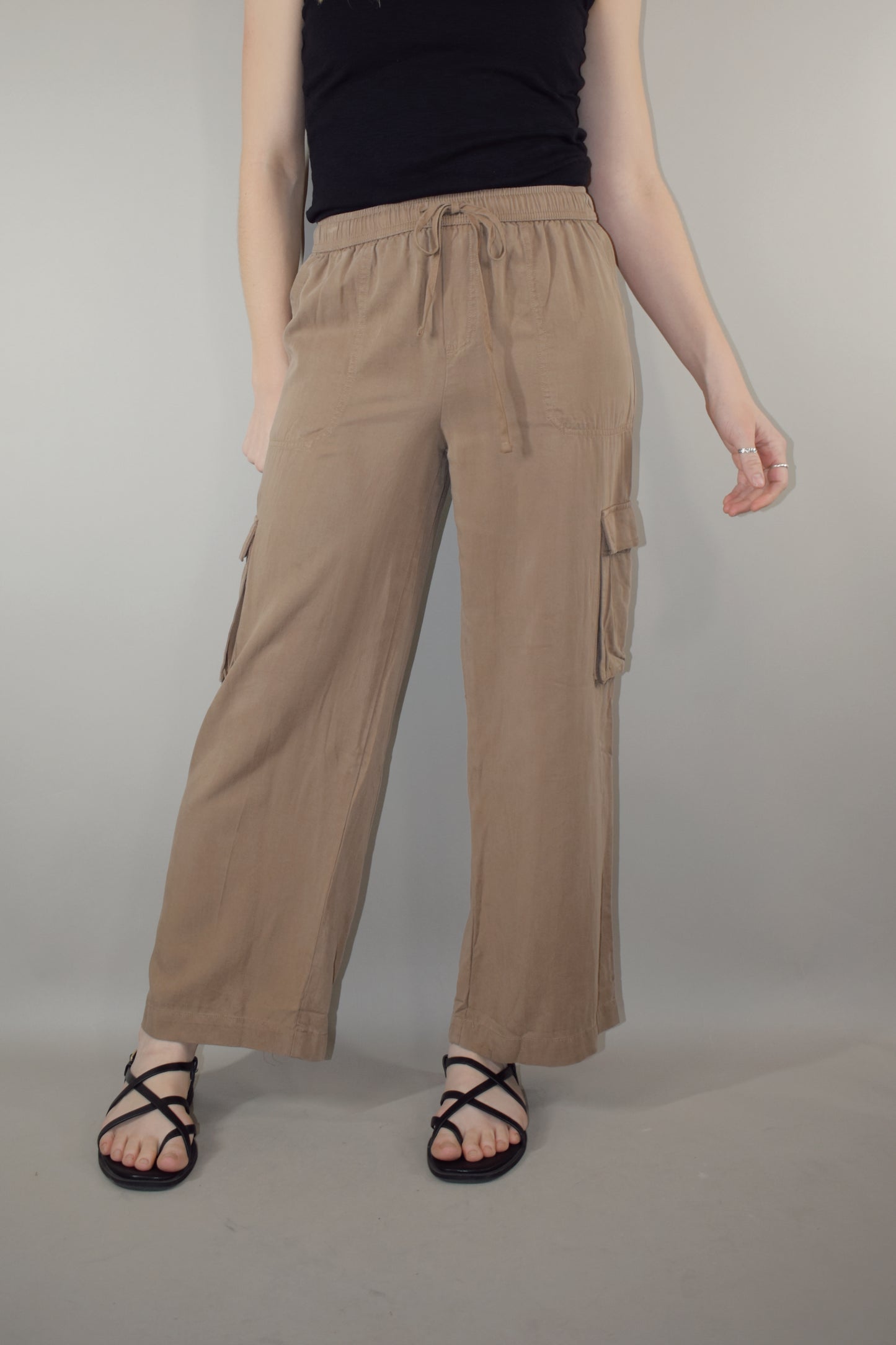 tencel cargo pants with slight wide leg elastic waistband with drawstring side pockets and side cargo pockets patch back pockets