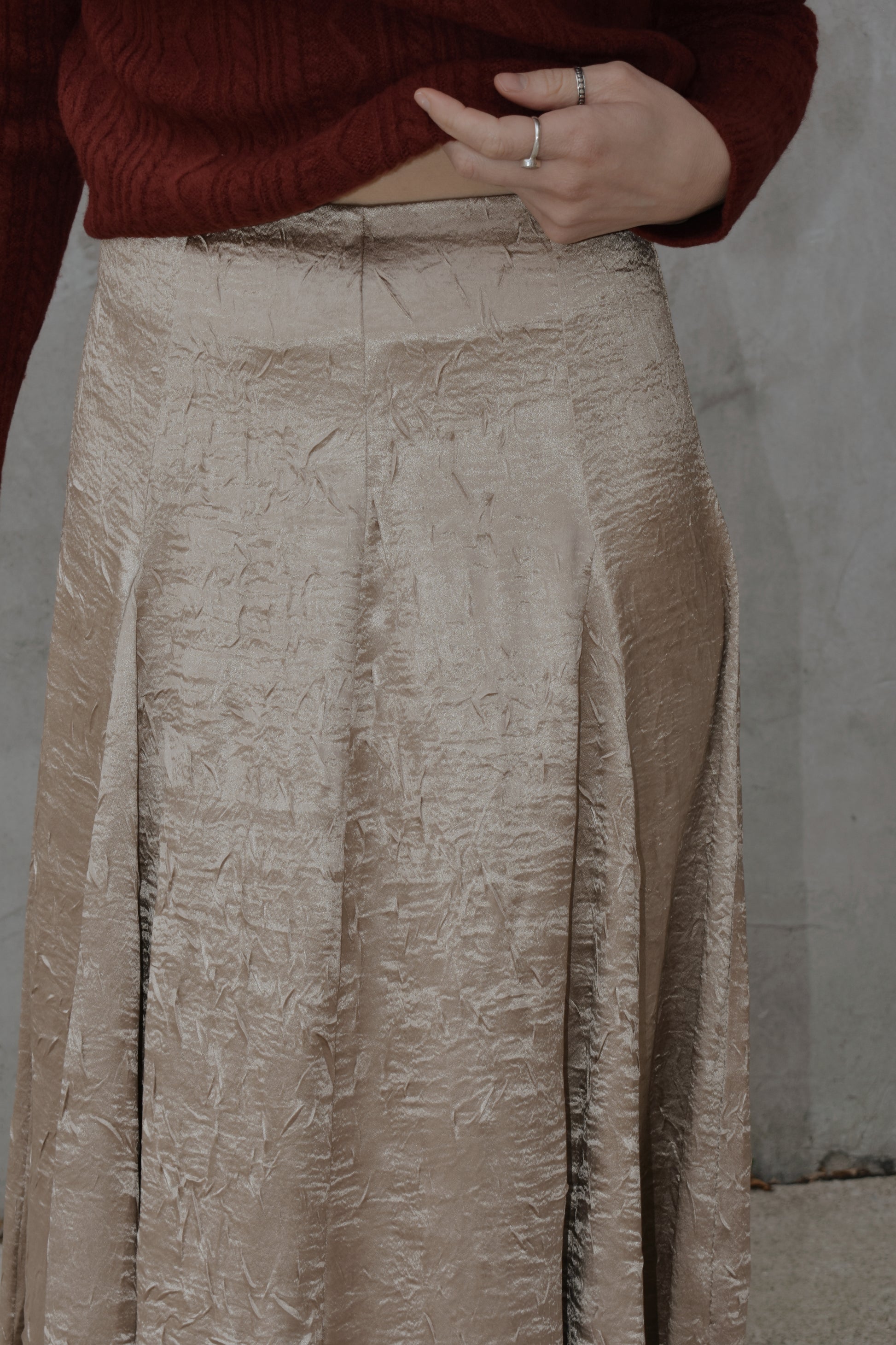 textured gold midi skirt with pleated details, a line flare, zip back enclosure, fitted waist