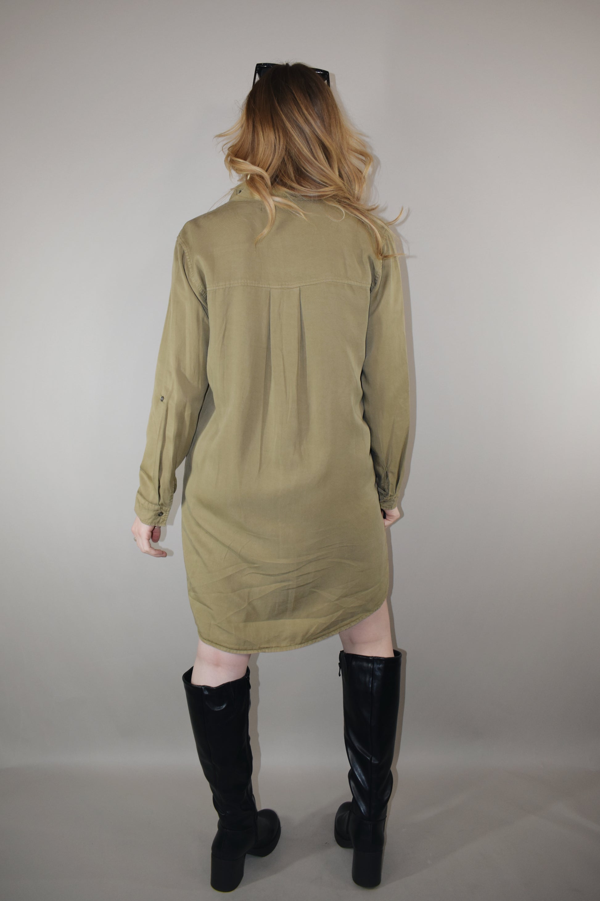 olive tencel button down collared mini dress with long sleeves with cuff option and one patch breast pocket high low hem 