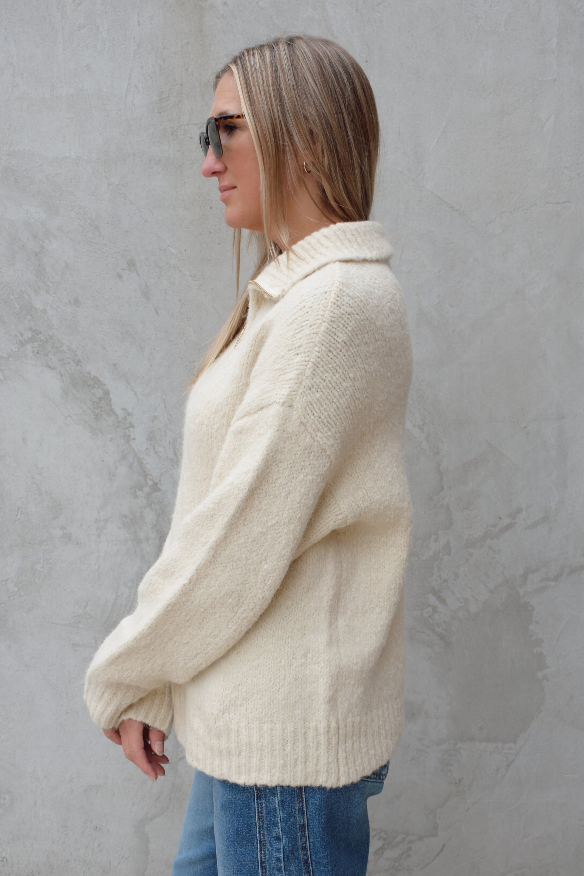 cozy knit blend quarter zip sweater with fold over collar, ribbed hem, full length and loose fit, drop shoulders