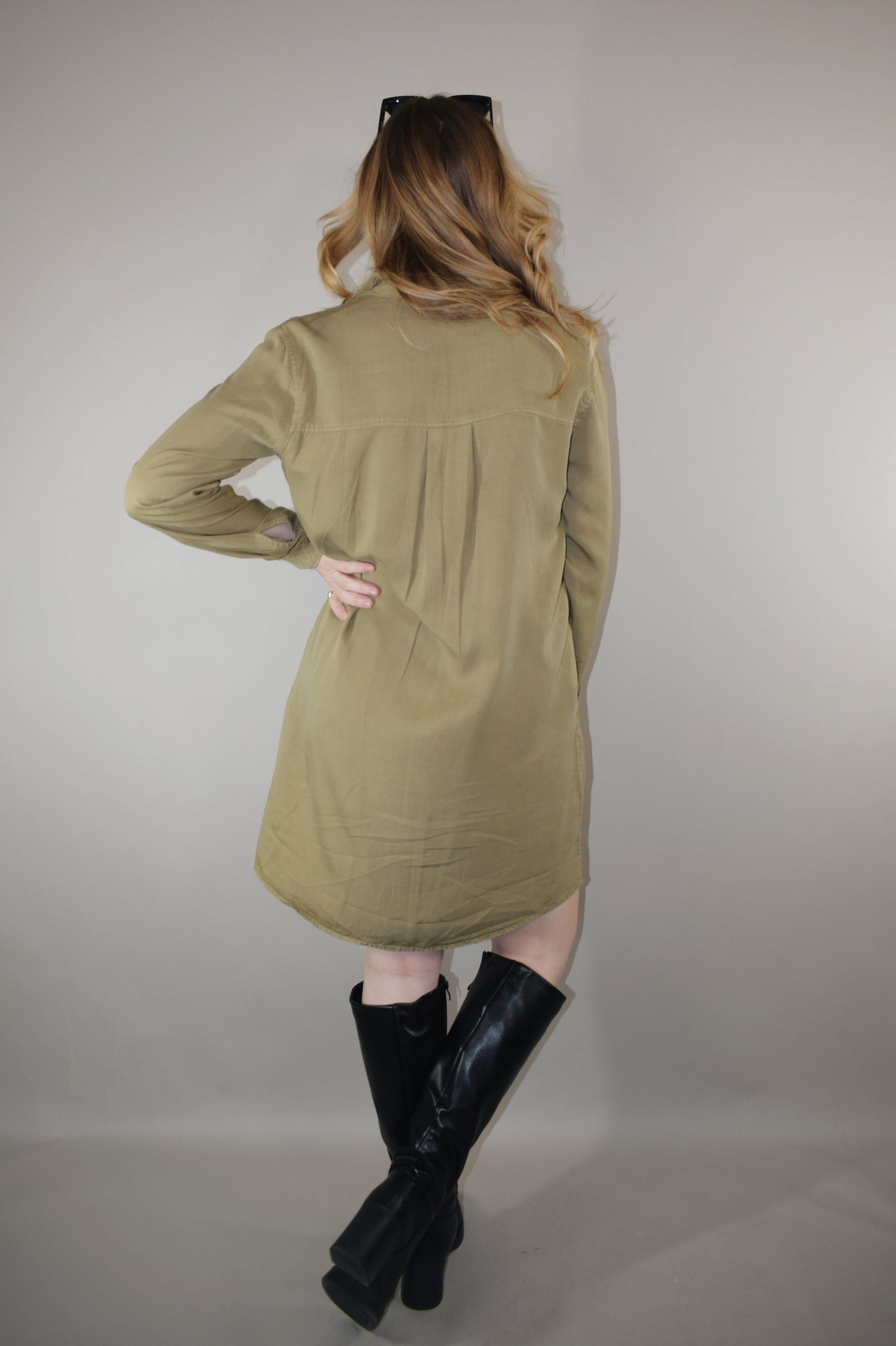 olive tencel button down collared mini dress with long sleeves with cuff option and one patch breast pocket high low hem 