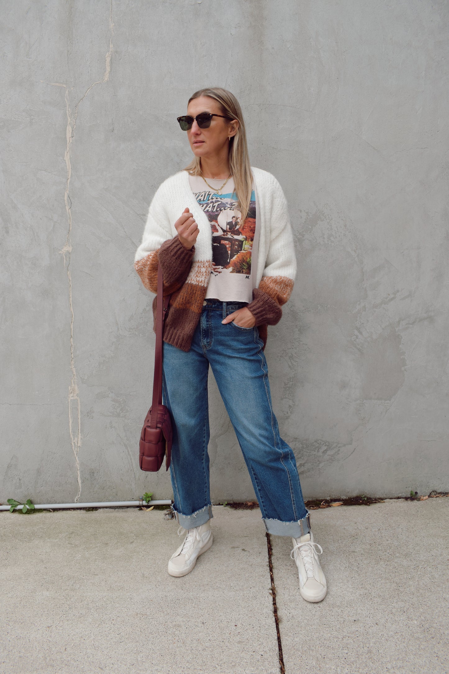 cozy relaxed fit cardigan with bottom half color blocked with earthy tones, white on top drop shoulder ribbed hem full length 