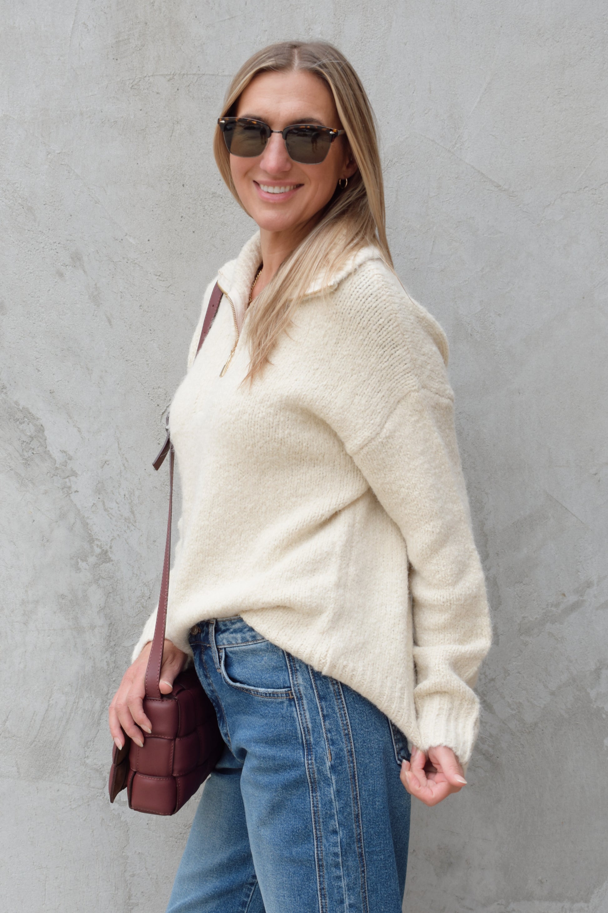 cozy knit blend quarter zip sweater with fold over collar, ribbed hem, full length and loose fit, drop shoulders