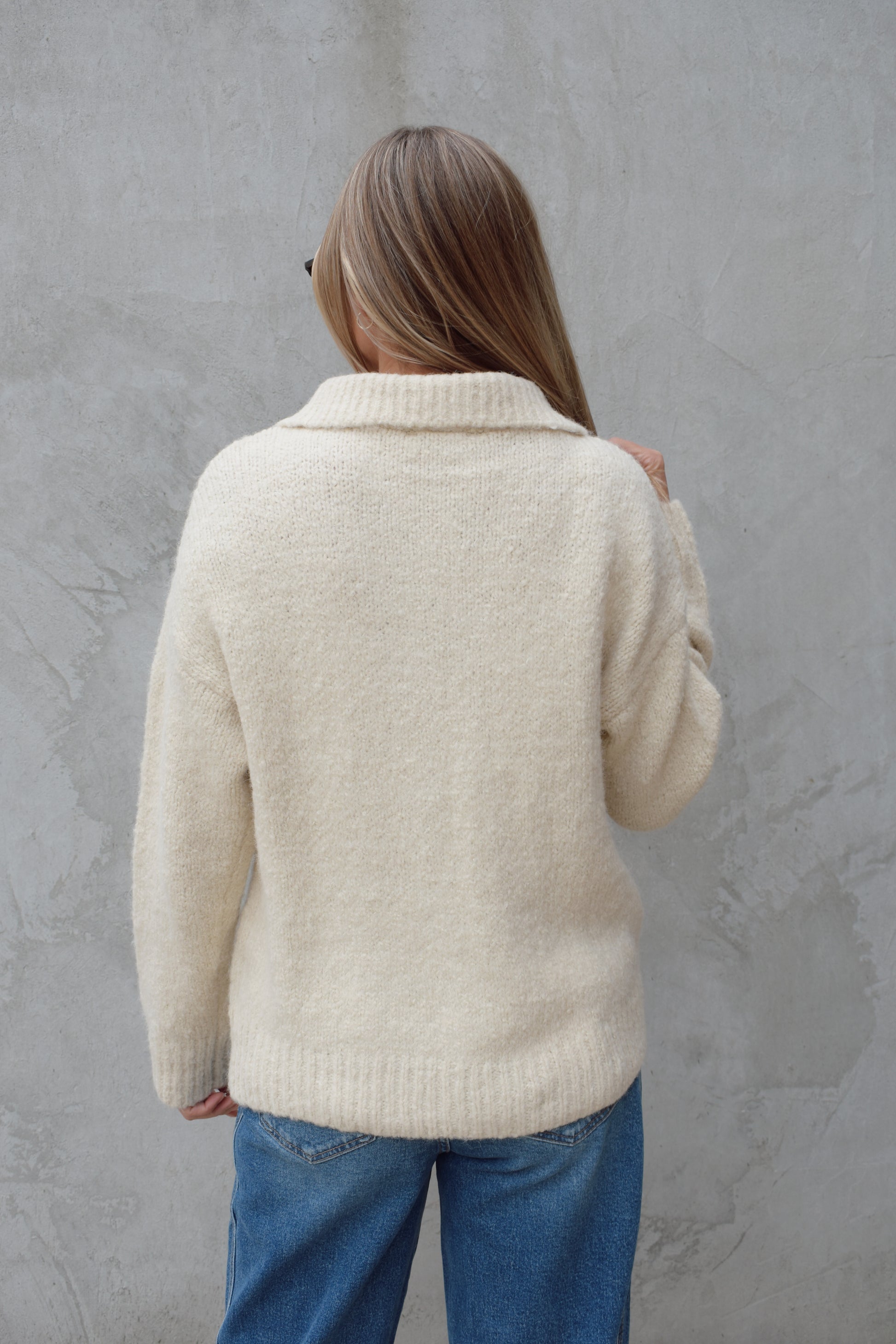cozy knit blend quarter zip sweater with fold over collar, ribbed hem, full length and loose fit, drop shoulders