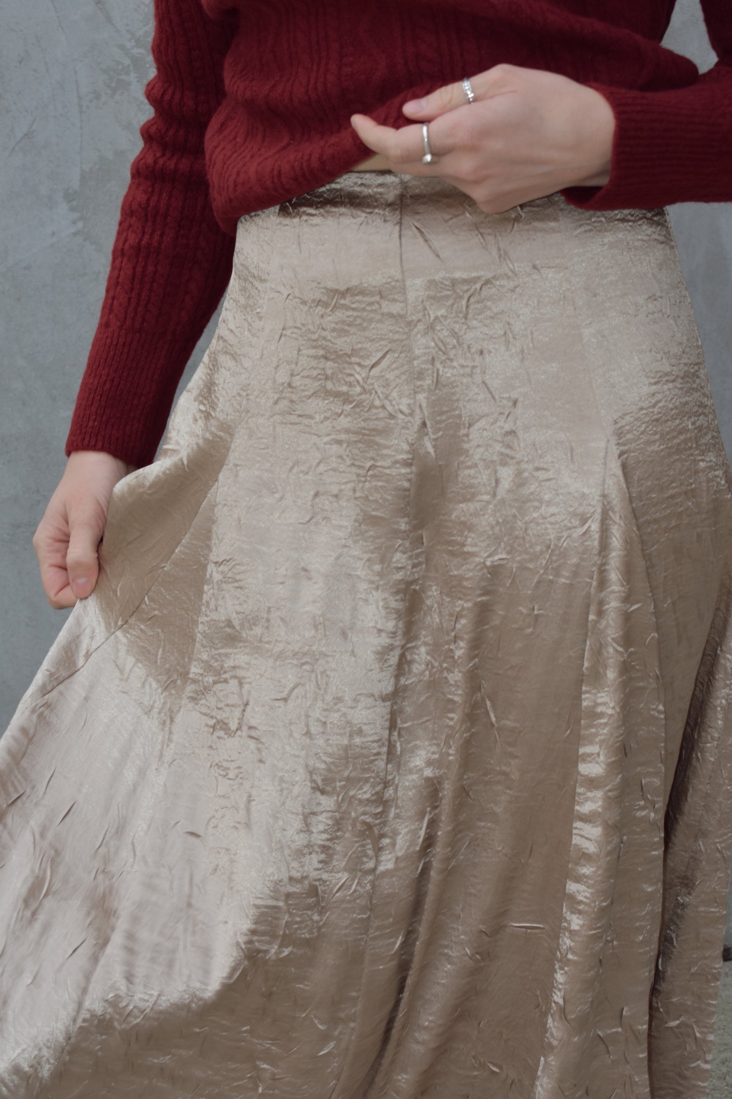 textured gold midi skirt with pleated details, a line flare, zip back enclosure, fitted waist