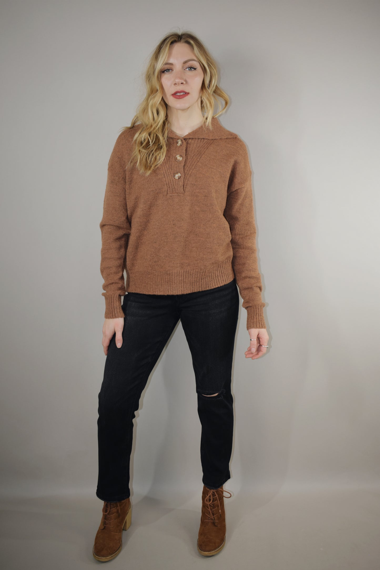 full length sweater with collar and 3 buttons down the neckline with ribbed panel -relaxed fit