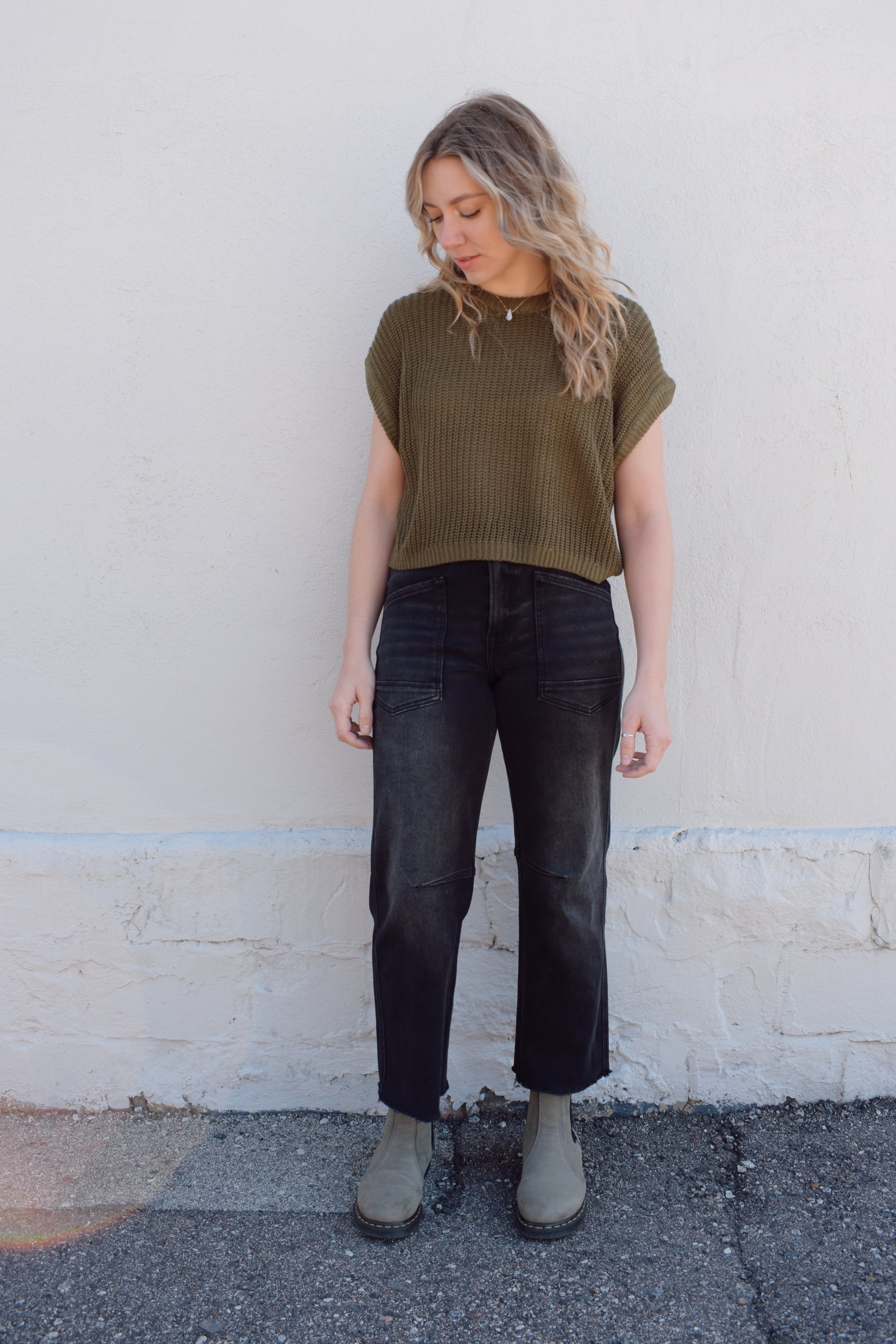 black washed cropped slight barrel jeans stretch denim slanted patch pockets, raw hem, seam detail at knee, high rise, no holes