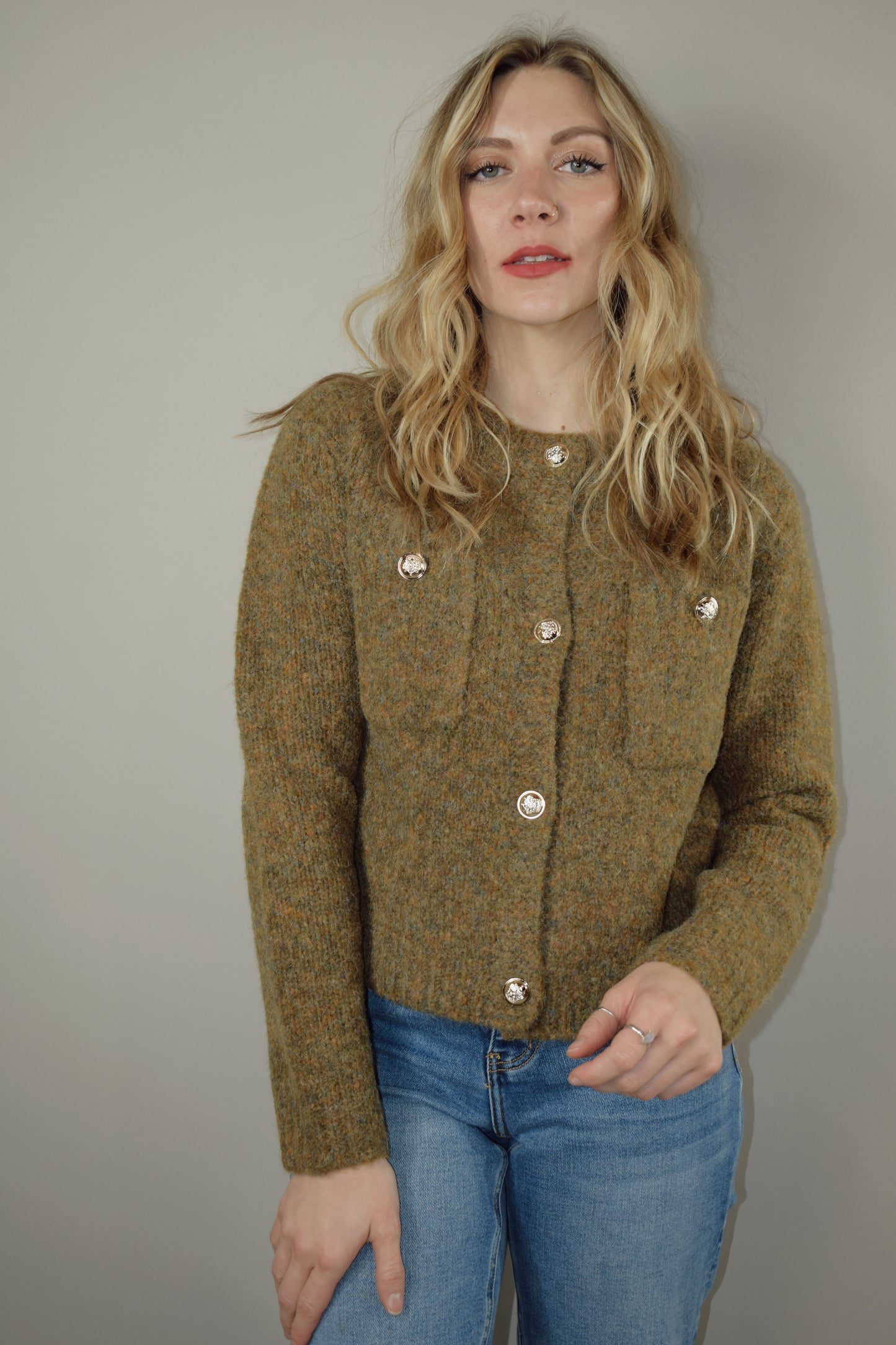 multicolored knit boucle waist length cardigan top with gold buttons along front crew neck breast patch pockets with gold buttons 