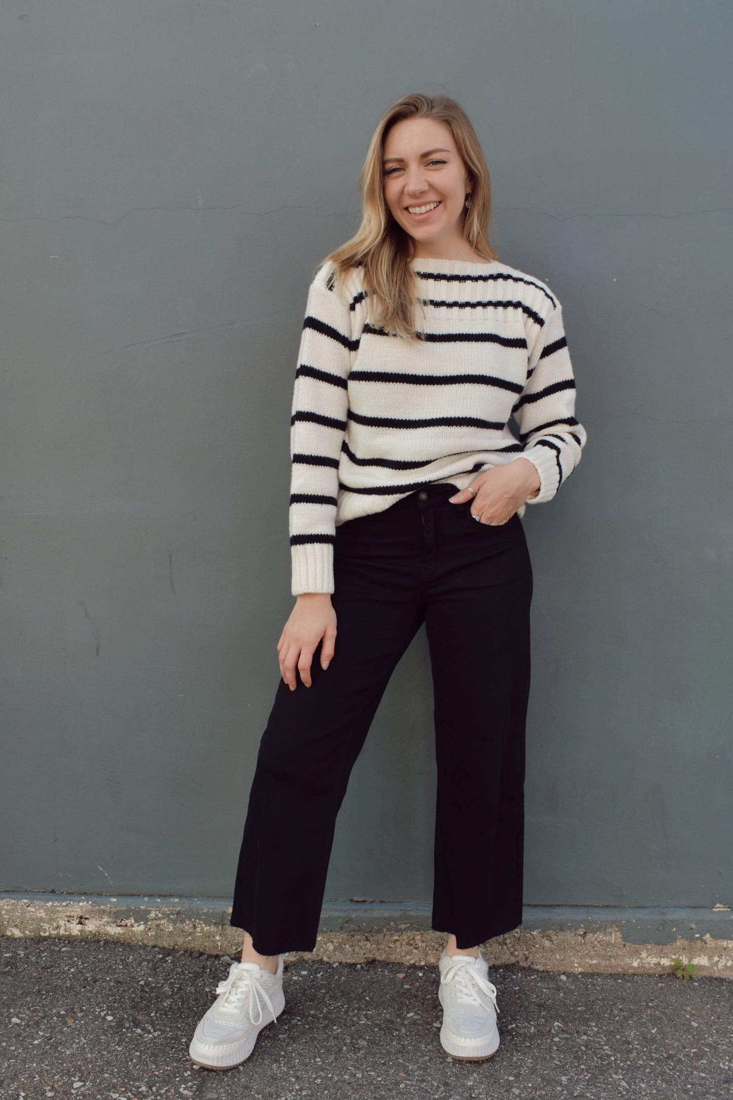 full length striped sweater with boat neck and ribbed detailing on neckline, hem and cuffs. horizontal stripes