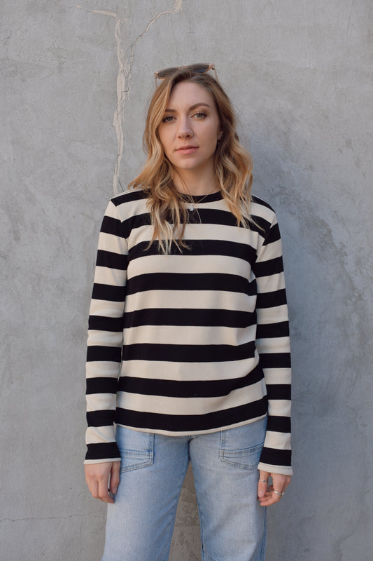 long sleeve full length black and beige striped crew neck. stripes are wide and horizontal. relaxed fit